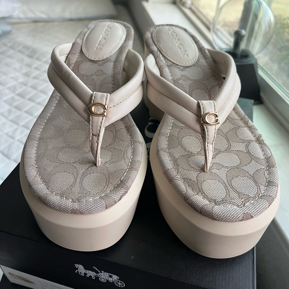 Women 8,worn once. DISCONTINUED coach platform sandal. Throw a price.